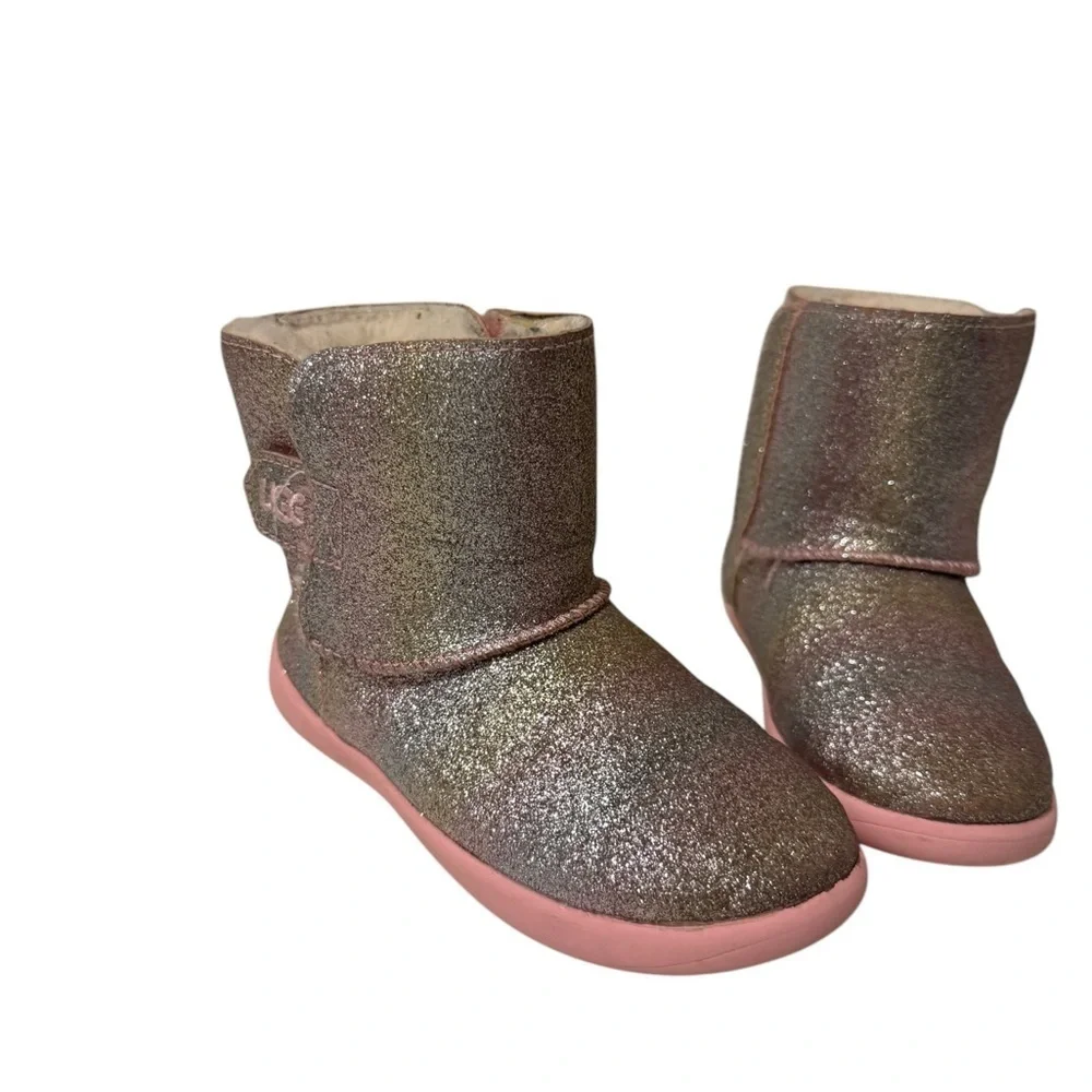 UGG’s Sparkly Gold and Pink Boots.